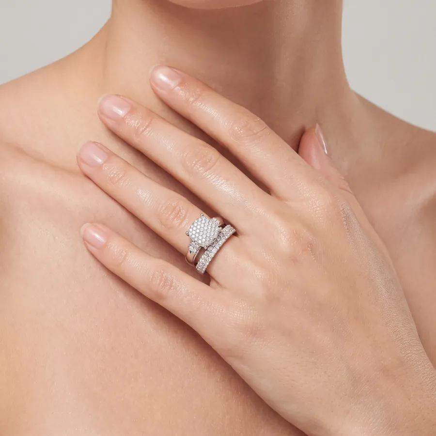 Diamond cluster ring in white gold worn on the hand